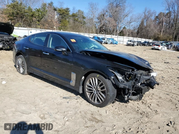 2018 Kia Stinger with VIN KNAE15LA2J6017155, listed as a Copart auction lot 46068735 with 98,295 mi miles and Salvage Title. Bid and sale history available at DreamBid. Image 4.