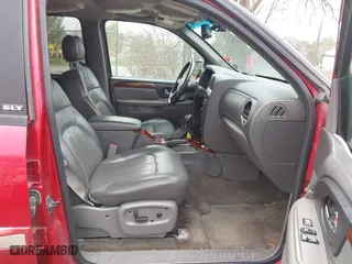 2003 GMC Envoy SLE with VIN 1GKDT13S932334925, listed as a IAAI auction lot 42071477 with 232,935 mi miles. Bid and sale history available at carsss.com. Image 5.