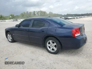 2010 Dodge Charger SXT with VIN 2B3CA3CV5AH185969, listed as a Copart auction lot 55684185 with 138,384 mi miles and Salvage Title. Bid and sale history available at DreamBid. Image 2.
