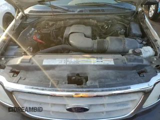 2000 Ford F-150 XL with VIN 1FTRF17W7YNB07289, listed as a Copart auction lot 80981994 with 189,969 mi miles and Salvage title. Bid and sale history available at DreamBid. Image 11.
