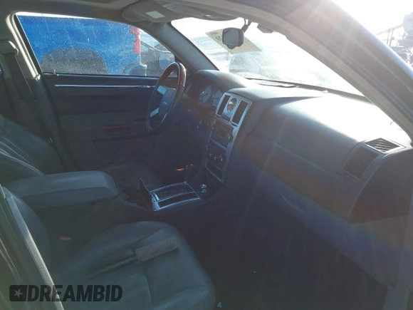 2005 Chrysler 300 with VIN 2C3AA63H65H526016, listed as a IAAI auction lot 41296420 with 136,794 mi miles. Bid and sale history available at carsss.com. Image 5.