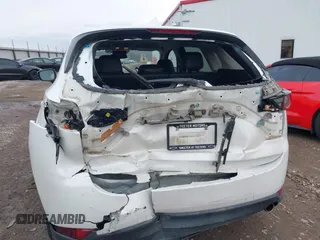 2020 Mazda CX-5 Touring with VIN JM3KFBCM6L0764982, listed as a IAAI auction lot 41632293 with 96,042 mi miles. Bid and sale history available at carsss.com. Image 6.