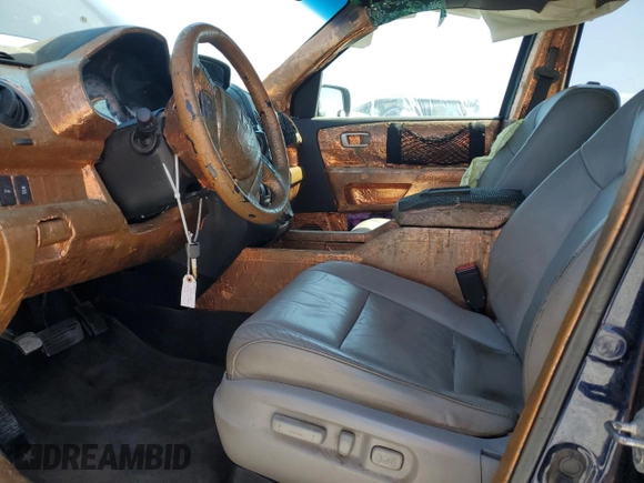 2013 Honda Pilot Touring with VIN 5FNYF3H99DB037819, listed as a Copart auction lot 52762565 with 197,889 mi miles and Salvage Title. Bid and sale history available at DreamBid. Image 7.