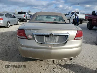 2004 Chrysler Sebring Limited z VIN 1C3EL65R14N257513, wystawiony jako Copart lot #84049844 z przebiegiem 82 402 mil mil oraz Szkoda całkowita • Salvage title. Historia ofert i sprzedaży dostępna na DreamBid. Obrazek 6.