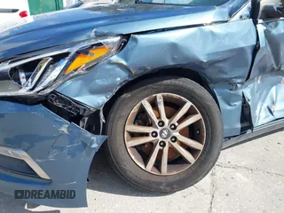 2015 Hyundai Sonata SE z VIN 5NPE24AF6FH105910, wystawiony jako IAAI lot #42272532 z przebiegiem Nie podano mil oraz . Historia ofert i sprzedaży dostępna na DreamBid. Obrazek 12.