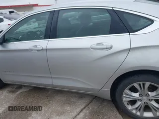 2014 Chevrolet Impala LT with VIN 2G1125S33E9103583, listed as a IAAI auction lot 42125293 with 143,951 mi miles and . Bid and sale history available at DreamBid. Image 14.