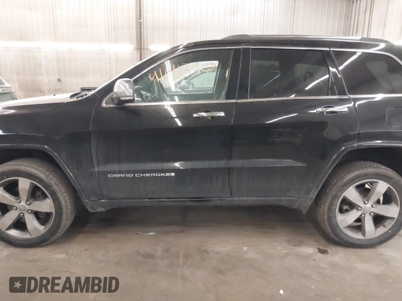 2014 Jeep Grand Cherokee Overland with VIN 1C4RJFCG8EC177899, listed as a IAAI auction lot 41695290 with 200,867 mi miles and . Bid and sale history available at DreamBid. Image 15.