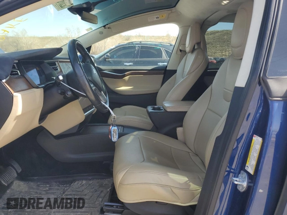 2017 Tesla Model X 90D with VIN 5YJXCDE23HF044790, listed as a Copart auction lot 52376565 with 105,712 mi miles and Salvage Title. Bid and sale history available at DreamBid. Image 7.