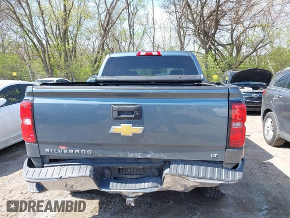 2014 Chevrolet Silverado 1500 LT with VIN 3GCUKREH9EG313565, listed as a IAAI auction lot 42003086 with 112,322 mi miles and . Bid and sale history available at DreamBid. Image 16.