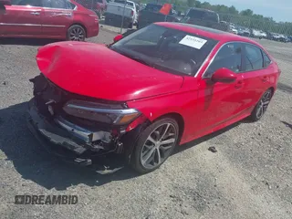 2024 Honda Civic Touring with VIN 2HGFE1F97RH302435, listed as a IAAI auction lot 42155203 with 23,494 mi miles and . Bid and sale history available at DreamBid. Image 18.
