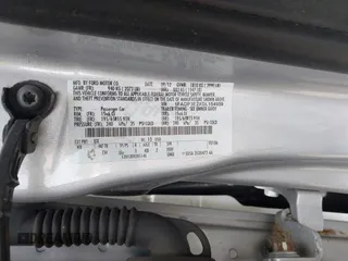 2013 Ford Focus S with VIN 1FADP3E2XDL154959, listed as a IAAI auction lot 42114562 with 98,031 mi miles. Bid and sale history available at carsss.com. Image 9.