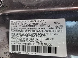 2023 Honda Ridgeline RTL-E with VIN 5FPYK3F78PB010961, listed as a Copart auction lot 51458635 with 33,508 mi miles and Salvage title. Bid and sale history available at DreamBid. Image 12.