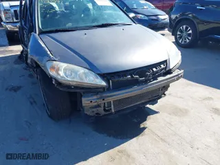 2004 Honda Civic LX with VIN 2HGES16664H624292, listed as a IAAI auction lot 41597991 with 207,443 mi miles. Bid and sale history available at carsss.com. Image 18.