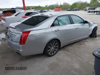 2016 Cadillac CTS Luxury Collection RWD z VIN 1G6AR5SXXG0128843, wystawiony jako IAAI lot #41404946 z przebiegiem 80 234 mil mil oraz . Historia ofert i sprzedaży dostępna na DreamBid. Obrazek 4.