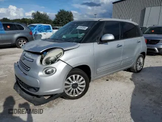 2014 FIAT 500L Easy with VIN ZFBCFABH1EZ027525, listed as a Copart auction lot 85187854 with 128,837 mi miles and Salvage Title. Bid and sale history available at carsss.com. Image 1.