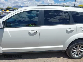 2017 Dodge Journey SXT z VIN 3C4PDDBG7HT512776, wystawiony jako IAAI lot #41967109 z przebiegiem 109 747 mil mil oraz . Historia ofert i sprzedaży dostępna na DreamBid. Obrazek 14.