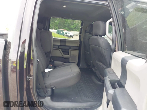 2020 Ford F-150 XL with VIN 1FTEW1EP3LFC56067, listed as a IAAI auction lot 42132791 with 103,357 mi miles and . Bid and sale history available at DreamBid. Image 8.