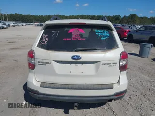 2014 Subaru Forester 2.5i Touring with VIN JF2SJAMC6EH413261, listed as a IAAI auction lot 40672035 with 1 mi miles. Bid and sale history available at carsss.com. Image 16.
