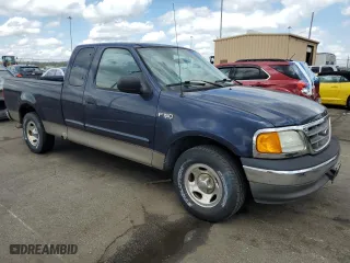 2004 Ford F-150 Heritage XL with VIN 2FTRX17284CA47243, listed as a Copart auction lot 53980745 with 205,044 mi miles and Clean Title. Bid and sale history available at carsss.com. Image 4.