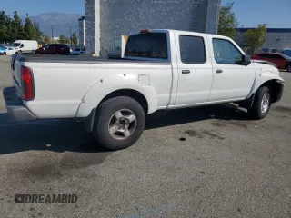 2004 Nissan Frontier XE with VIN 1N6ED29X94C423389, listed as a Copart auction lot 57357255 with 195,700 mi miles and Salvage title. Bid and sale history available at DreamBid. Image 3.