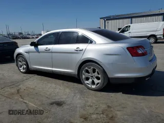 2011 Ford Taurus SEL with VIN 1FAHP2EWXBG175623, listed as a Copart auction lot 68707944 with 185,826 mi miles and Salvage Title. Bid and sale history available at DreamBid. Image 2.