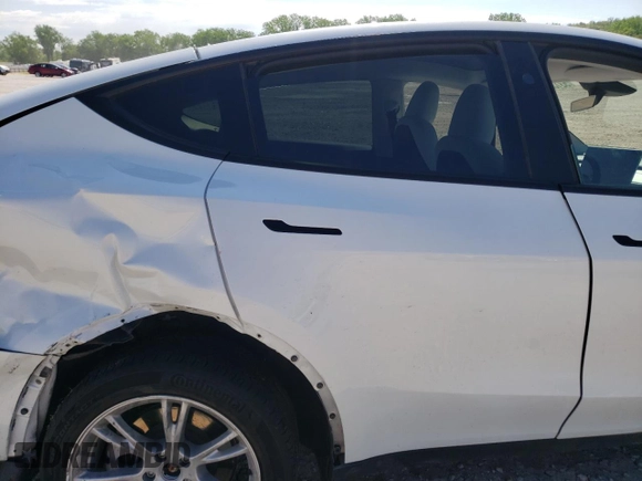 2023 Tesla Model Y Long Range with VIN 7SAYGDEE6PF861451, listed as a Copart auction lot 53133854 with 7,216 mi miles and Salvage Title. Bid and sale history available at DreamBid. Image 10.