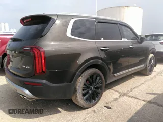 2020 Kia Telluride SX with VIN 5XYP5DHC7LG003935, listed as a IAAI auction lot 32399947 with 82,256 mi miles and . Bid and sale history available at DreamBid. Image 4.