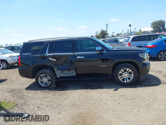 2015 Chevrolet Tahoe LT with VIN 1GNSCBKC8FR612607, listed as a IAAI auction lot 42099907 with 138,037 mi miles and . Bid and sale history available at DreamBid. Image 13.