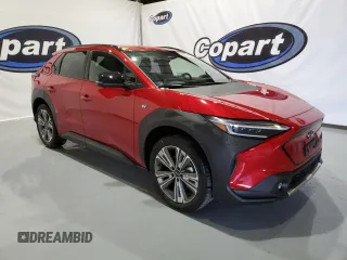 2023 Subaru Solterra Premium z VIN JTMABABAXPA024028, wystawiony jako Copart lot #73780443 z przebiegiem 4074 mil mil oraz . Historia ofert i sprzedaży dostępna na DreamBid. Obrazek 4.