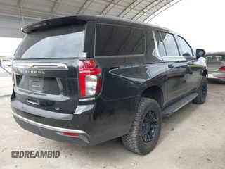 2021 Chevrolet Suburban LT z VIN 1GNSCCKDXMR421833, wystawiony jako IAAI lot #41738389 z przebiegiem 56 757 mil mil oraz . Historia ofert i sprzedaży dostępna na DreamBid. Obrazek 4.