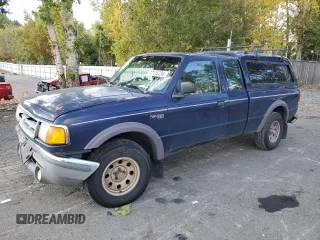 1997 Ford Ranger XLT with VIN 1FTDR15X3VPB14866, listed as a Copart auction lot 77113734 with 171,166 mi miles and Salvage Title. Bid and sale history available at carsss.com. Image 1.
