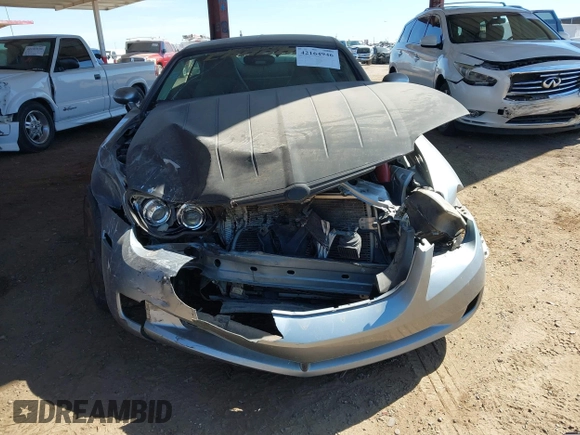 2004 Chrysler Crossfire z VIN 1C3AN69L44X017780, wystawiony jako IAAI lot #42164946 z przebiegiem Nie podano mil oraz . Historia ofert i sprzedaży dostępna na DreamBid. Obrazek 11.