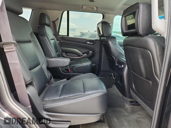 2015 Chevrolet Tahoe LT with VIN 1GNSKBKC0FR226220, listed as a Copart auction lot 59214125 with 260,330 mi miles and Salvage title. Bid and sale history available at DreamBid. Image 11.