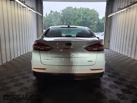 2020 Ford Fusion SEL with VIN 3FA6P0CD1LR154201, listed as a IAAI auction lot 42715761 with 99,448 mi miles and . Bid and sale history available at DreamBid. Image 46.