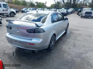 2017 Mitsubishi Lancer ES with VIN JA32V2FW9HU000485, listed as a IAAI auction lot 42019371 with 101,922 mi miles. Bid and sale history available at carsss.com. Image 4.