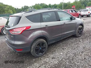 2013 Ford Escape SE z VIN 1FMCU9GX2DUA85071, wystawiony jako IAAI lot #42518686 z przebiegiem 159 157 mil mil oraz . Historia ofert i sprzedaży dostępna na DreamBid. Obrazek 4.
