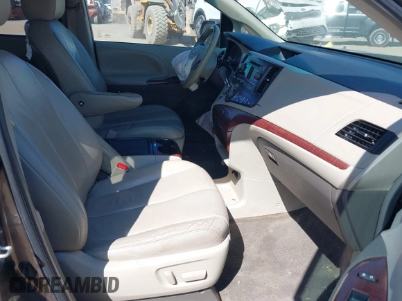 2012 Toyota Sienna XLE AAS with VIN 5TDYK3DC1CS186331, listed as a IAAI auction lot 41545031 with 240,788 mi miles and . Bid and sale history available at DreamBid. Image 5.