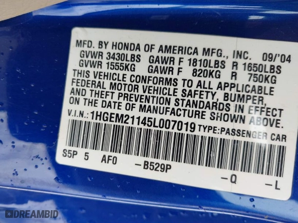 2005 Honda Civic Cpe VP with VIN 1HGEM21145L007019, listed as a IAAI auction lot 41596606 with 240,835 mi miles. Bid and sale history available at carsss.com. Image 9.
