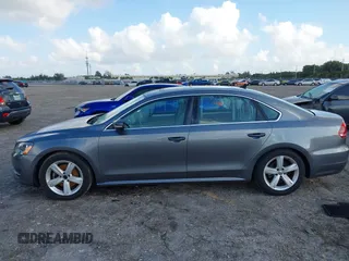 2013 Volkswagen Passat SE w/Sunroof & Nav with VIN 1VWBP7A35DC038217, listed as a IAAI auction lot 41944193 with 102,767 mi miles. Bid and sale history available at carsss.com. Image 14.