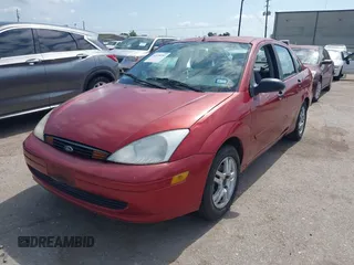 2004 Ford Focus SE z VIN 1FAFP34384W120763, wystawiony jako IAAI lot #42339251 z przebiegiem 262 686 mil mil oraz . Historia ofert i sprzedaży dostępna na DreamBid. Obrazek 2.