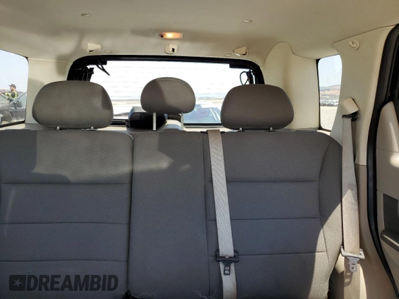 2009 Ford Escape Hybrid with VIN 1FMCU49399KB39692, listed as a Copart auction lot 64418925 with 147,204 mi miles and Salvage title. Bid and sale history available at DreamBid. Image 10.