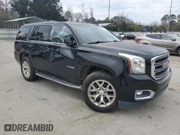 2015 GMC Yukon SLT with VIN 1GKS1BKC1FR615562, listed as a Copart auction lot 46374135 with 141,207 mi miles and Salvage Title. Bid and sale history available at carsss.com. Image 4.
