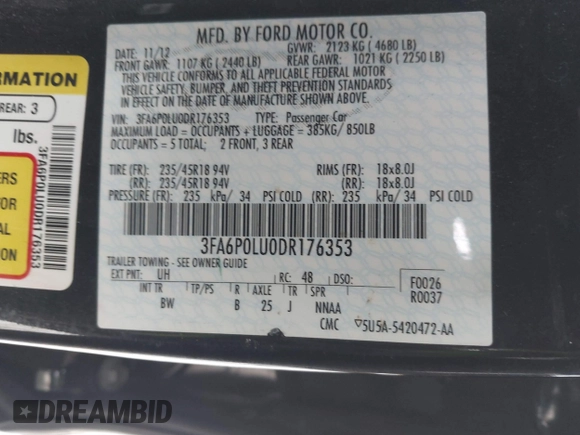 2013 Ford Fusion SE Hybrid with VIN 3FA6P0LU0DR176353, listed as a IAAI auction lot 41591238 with 190,717 mi miles. Bid and sale history available at carsss.com. Image 9.