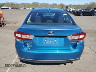 2018 Subaru Impreza Premium with VIN 4S3GKAD63J3605854, listed as a Copart auction lot 54986795 with 59,119 mi miles and Salvage title. Bid and sale history available at DreamBid. Image 6.