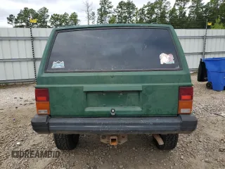 1996 Jeep Cherokee SE with VIN 1J4FT28S5TL244548, listed as a Copart auction lot 68908934 with 182,507 mi miles and Salvage Title. Bid and sale history available at carsss.com. Image 6.