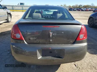 2005 Pontiac G6 z VIN 1G2ZG528654172007, wystawiony jako Copart lot #81188744 z przebiegiem 152 151 mil mil oraz Szkody całkowita. Historia ofert i sprzedaży dostępna na DreamBid. Obrazek 6.