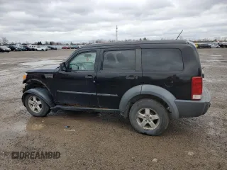 2007 Dodge Nitro SXT z VIN 1D8GU28K07W555205, wystawiony jako Copart lot #81165584 z przebiegiem 206 499 mil mil oraz Szkoda całkowita • Salvage title. Historia ofert i sprzedaży dostępna na DreamBid. Obrazek 2.