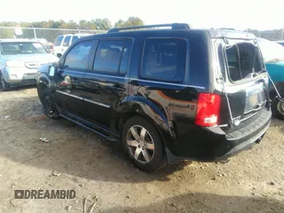2012 Honda Pilot Touring with VIN 5FNYF3H90CB035309, listed as a IAAI auction lot 41063215 with 228,081 mi miles and . Bid and sale history available at carsss.com. Image 3.