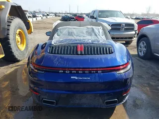 2022 Porsche 911 Carrera with VIN WP0CA2A96NS236957, listed as a IAAI auction lot 41154002 with 34,056 mi miles and . Bid and sale history available at DreamBid. Image 17.