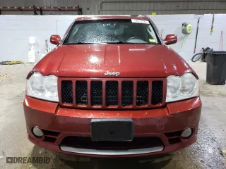 2007 Jeep Grand Cherokee SRT-8 with VIN 1J8HR78357C509051, listed as a Copart auction lot 79013524 with 161,580 mi miles and Salvage Title. Bid and sale history available at carsss.com. Image 5.